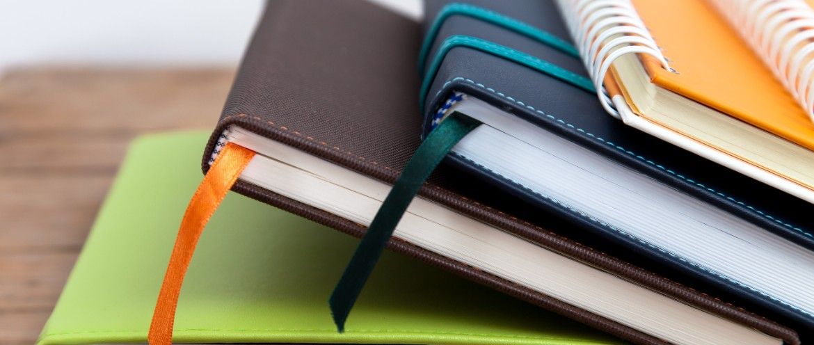 stack of diaries / journals